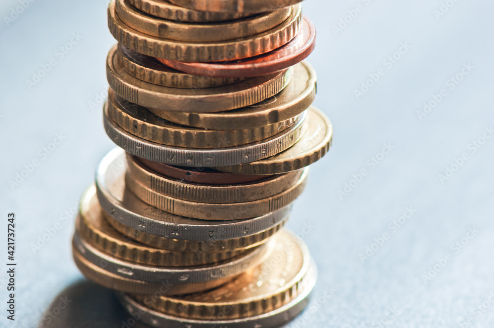 Money. Euro coins against grey background Money. Euro coins against grey background