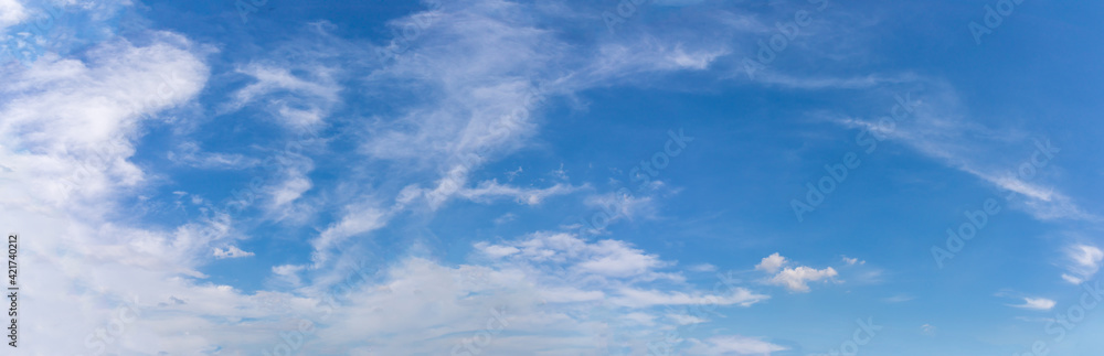 Panorama or panoramic photo of blue sky and white clouds or cloudscape. for breathing concepts background.
