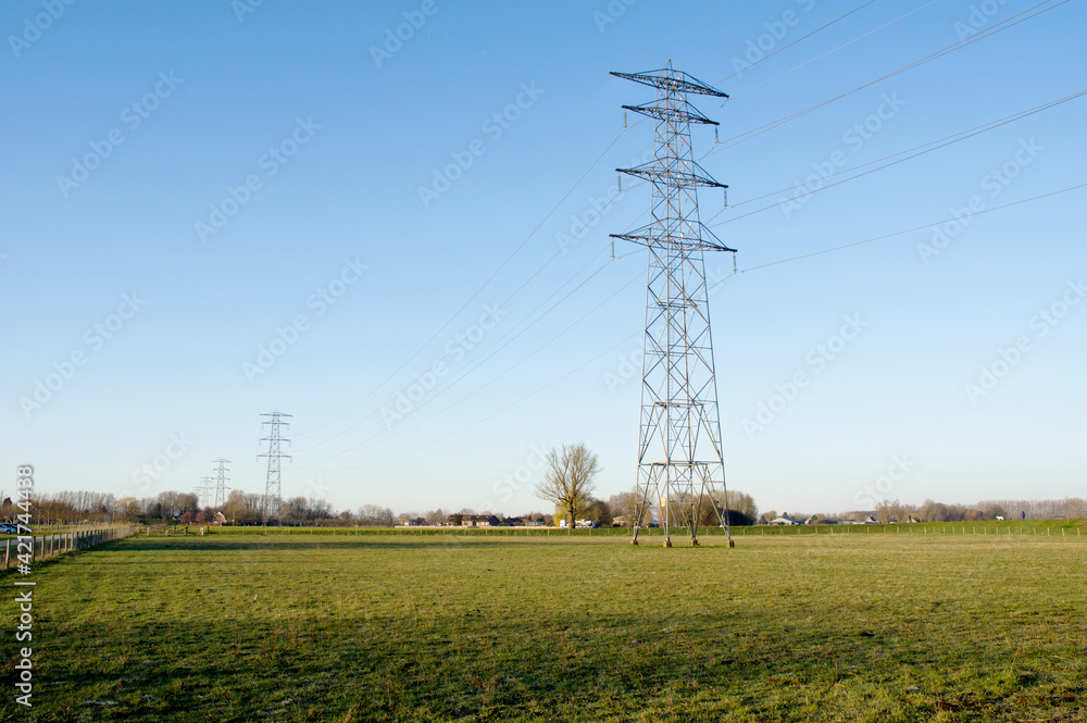 Electricity pole for transportation of electricity with a clear blue sky