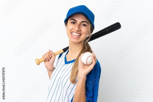 Young caucasian woman isolated on white background playing baseball