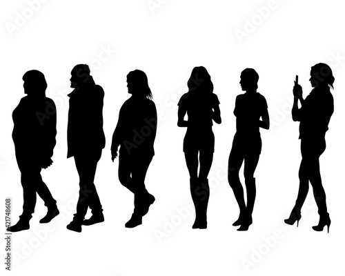 Young man and woman walking on street. Isolated silhouette on a white background