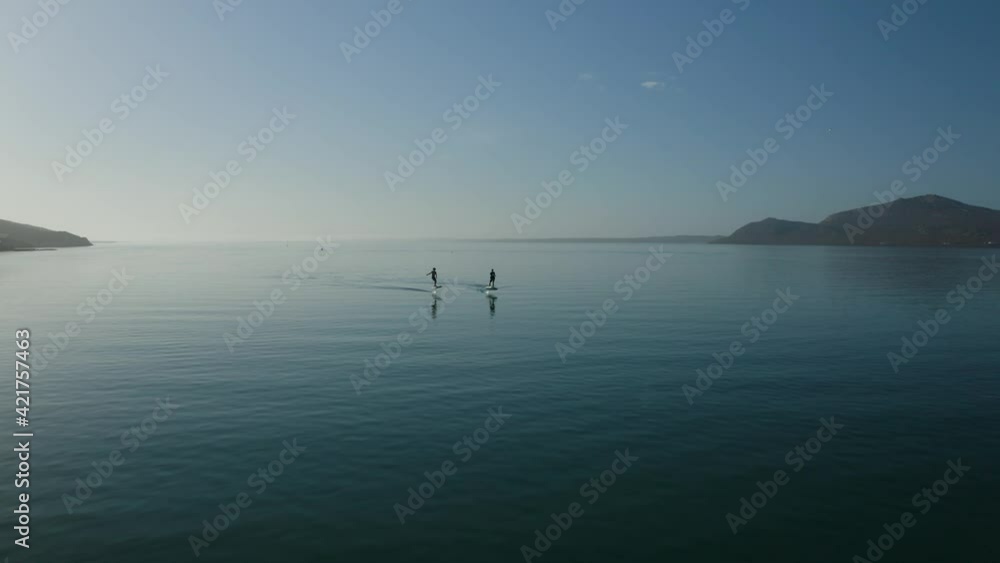 Drone Shot from a Rider wing foiling on the beautiful lagoon in south africa Drone Shot from a Rider wing foiling on the beautiful lagoon in south africa