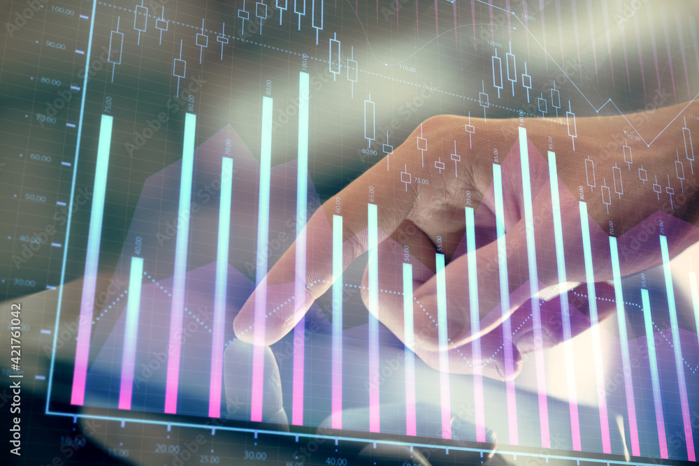 Multi exposure of man's hands holding and using a digital phone and forex graph drawing. Financial market concept.