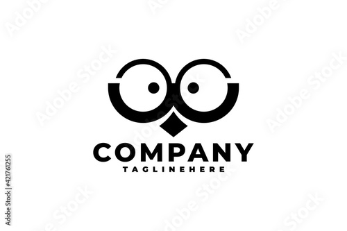 illustration of bird face wearing a glasses. owl face logo cartoon. letter w logo vector.