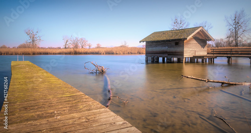 Chiemsee Bootssteg mit Bootshaus  photo