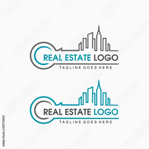 Real estate company logo with the concept of a city line or building resembling a key shape