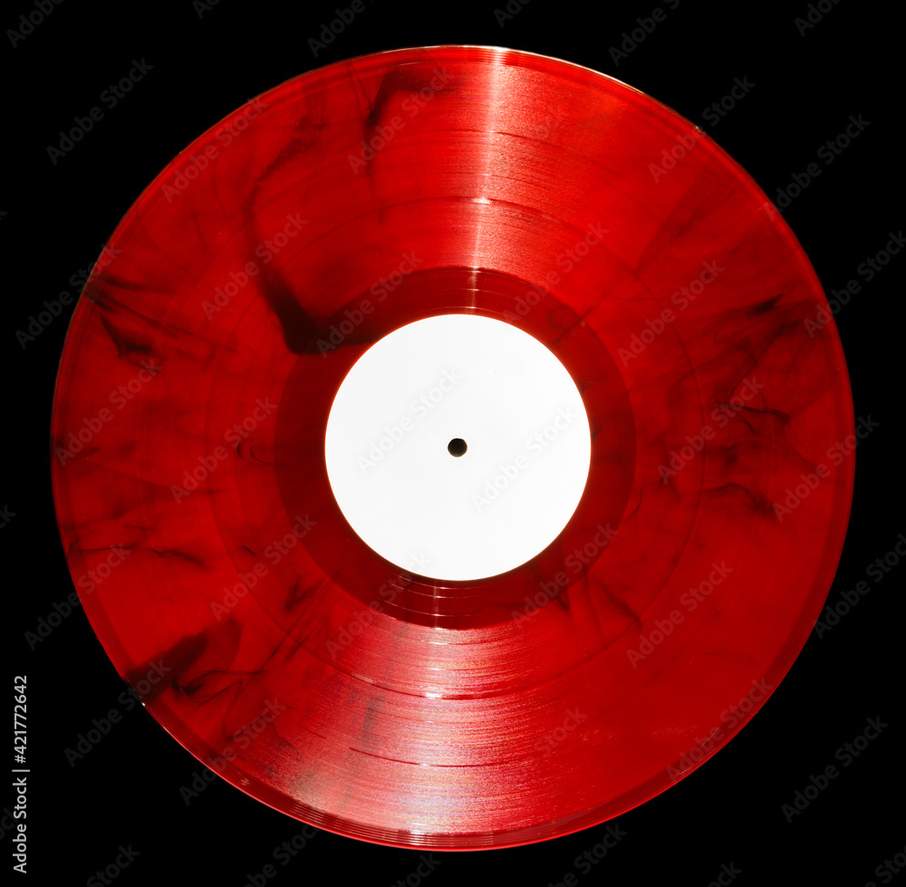 vinyl record of red color on a black background close-up Stock Photo
