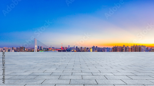 Empty square floor and Shanghai skyline with buildings at dusk,China.High angle view.