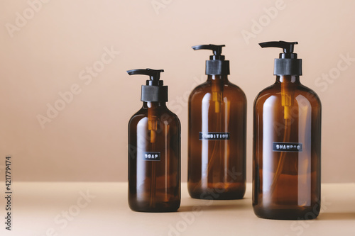 Brown glass jar for natural cosmetics. Buying goods without plastic packaging. Zero waste and sustainable plastic free lifestyle. Front view.