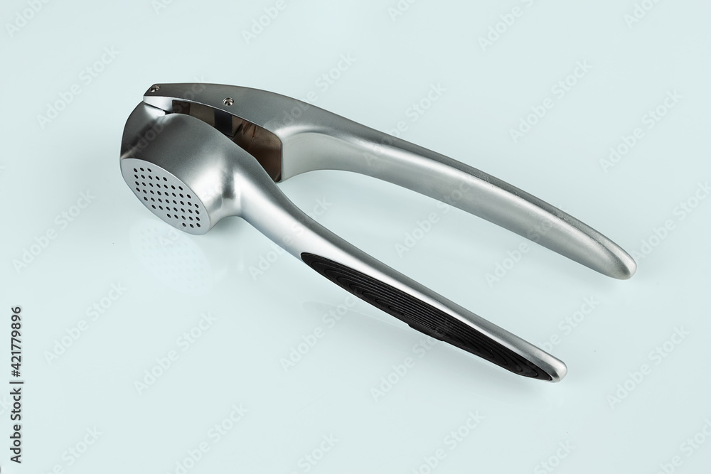 Obraz premium metal garlic press