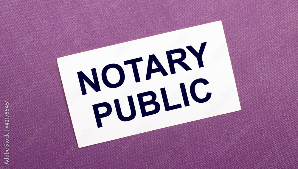 On a lilac background, a white card with the words NOTARY PUBLIC