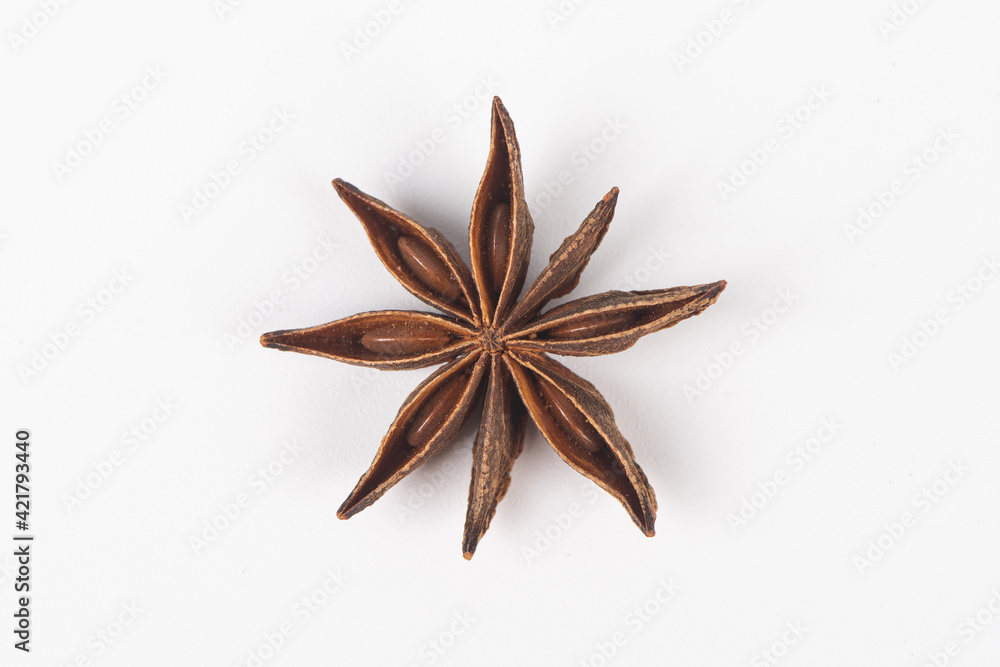 Star anise spice fruits and seeds isolated on white background closeup Star anise spice fruits and seeds isolated on white background closeup