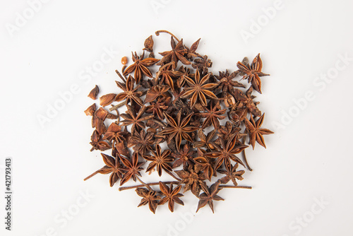 Star anise spice fruits and seeds isolated on white background closeup