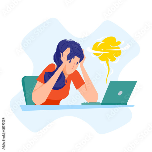 Woman at the table, looks at a broken laptop and holding her head. Smoke comes out of the computer