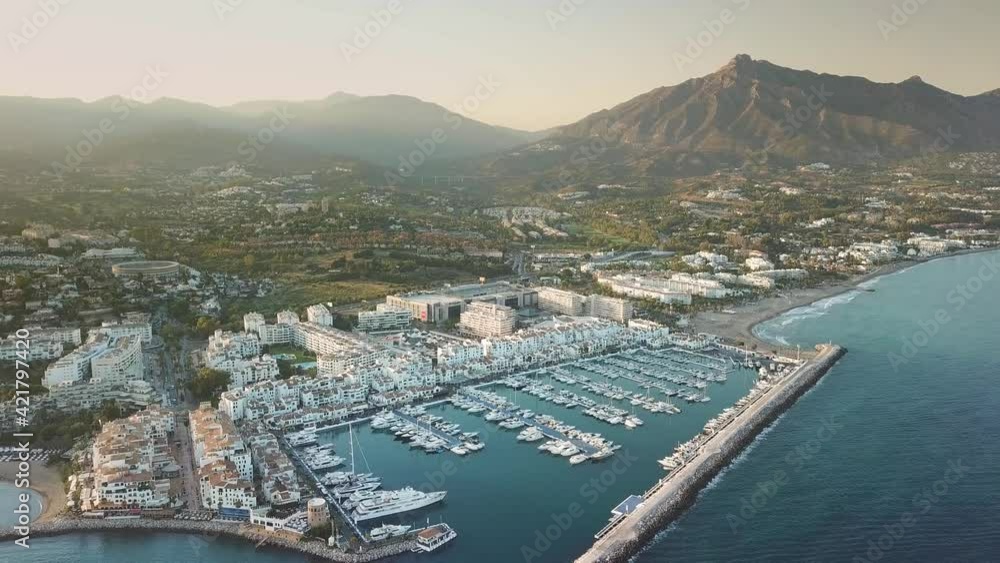 Video Stock 4K aerial perspective of luxury Puerto Banus Bay, in