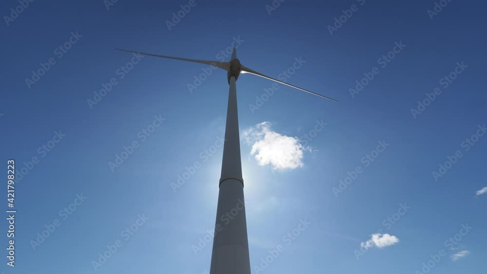 Wind turbine with blue sky at the back Wind turbine with blue sky at the back
