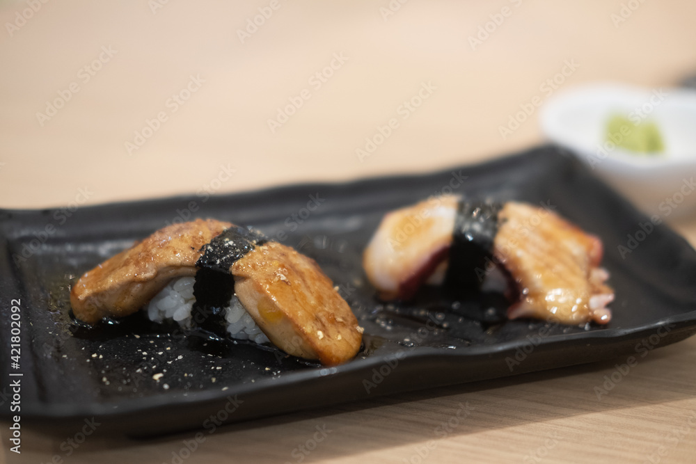 Tako squid sushi nigiri and Foie gras smoked sushi nigiri Japanese food.