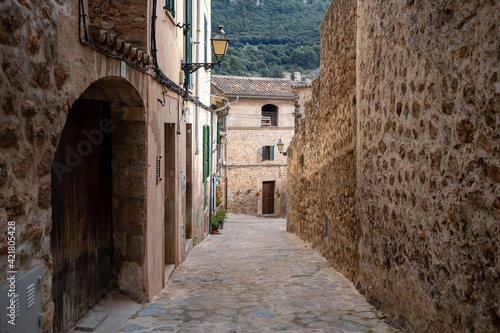 Beautiful streets with plants in the village of Valldemossa in the Sierra de Tramuntana. Palma de Mallorca  Spain