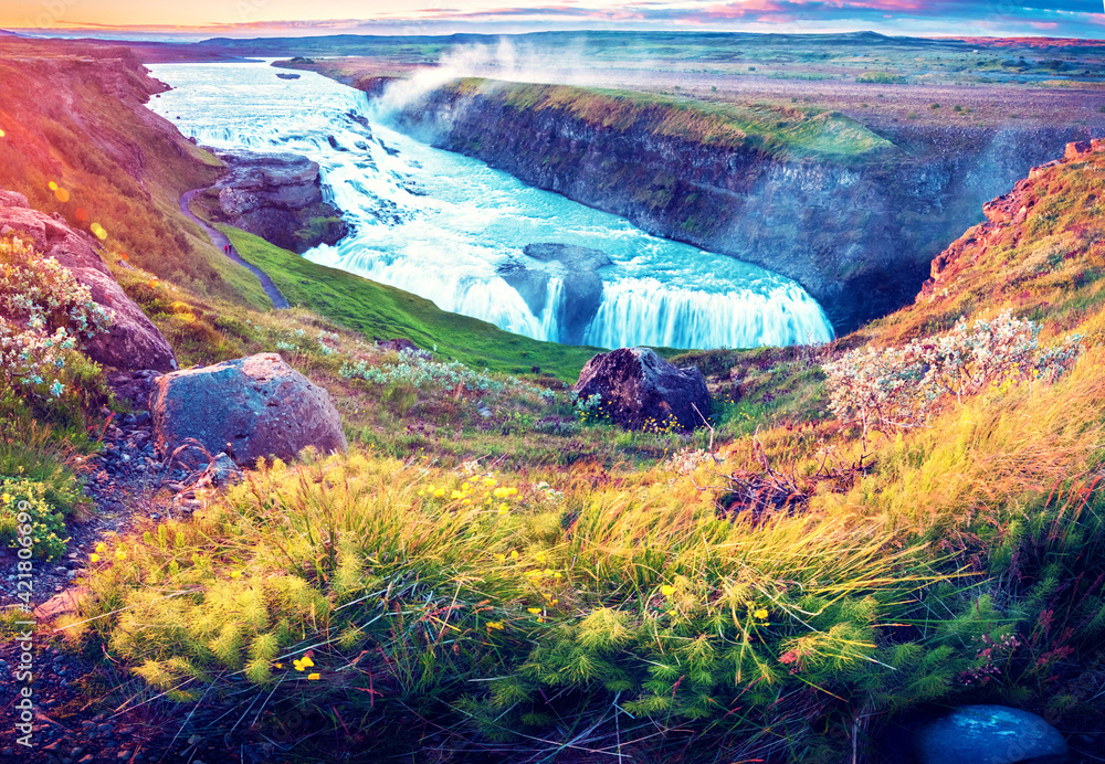 Magical charming bright colorful landscape with a famous Gullfoss waterfall in the sunrise in Iceland. Exotic countries. Amazing places. Popular tourist atraction. (Meditation, antistress - concept).