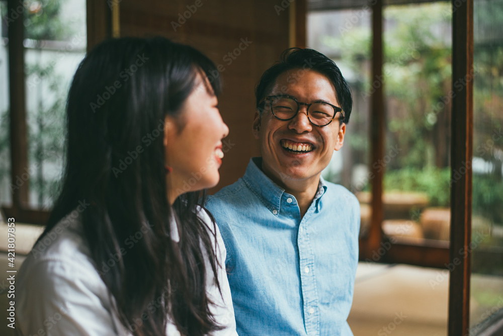 Young japanese couple spending time in their house Young japanese couple spending time in their house