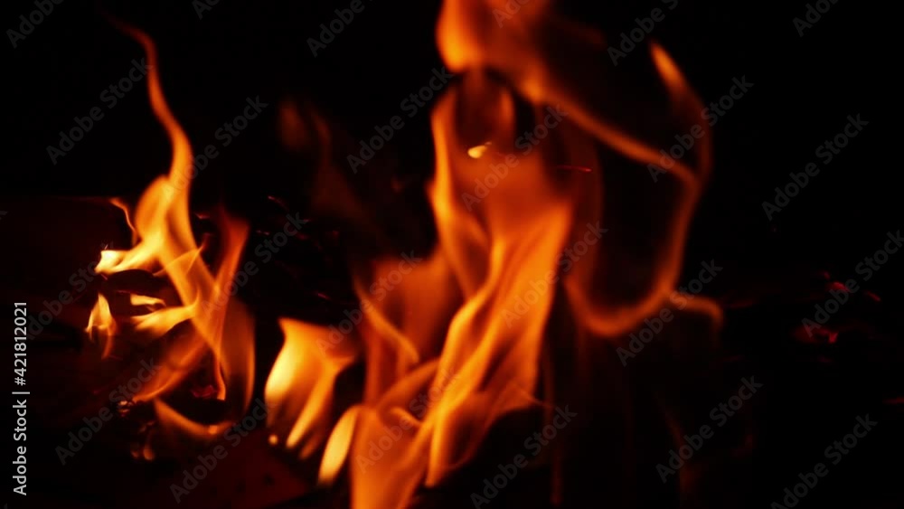 Close macro shot of fire flames with black background Close macro shot of fire flames with black background