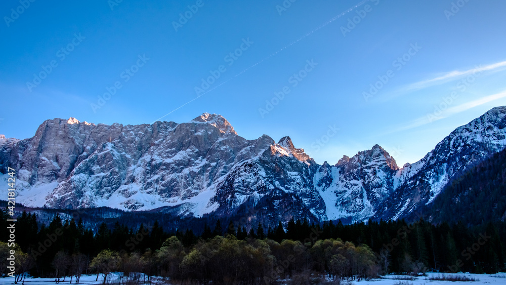 Fototapeta premium Sun goes down on Mangart, Italian alps