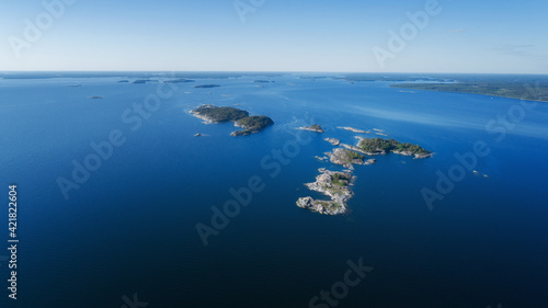 Aerial view of Baltic sea on a calm summer day. Small islands on Finnish archipelago.