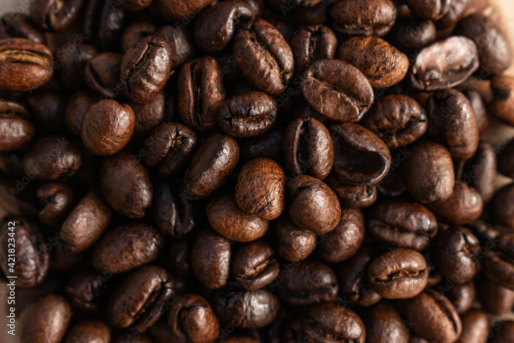 Fototapeta premium bright roasted coffee beans background