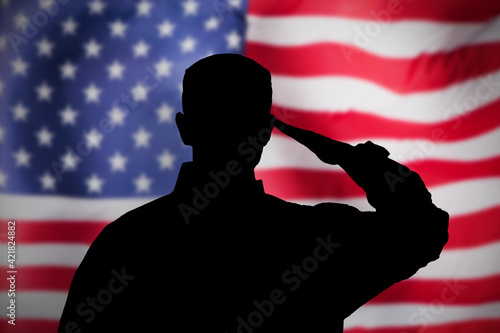 Fotografie US Military Soldier Saluting Flag. National Hero