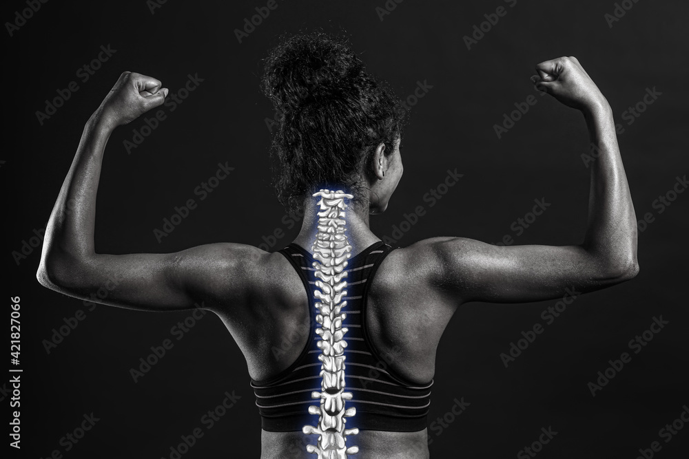 Sporty African-American woman with good posture on dark background, black and white effect - obrazy, fototapety, plakaty 