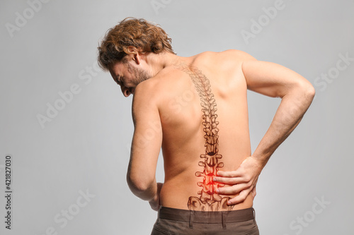 Young man suffering from ba...