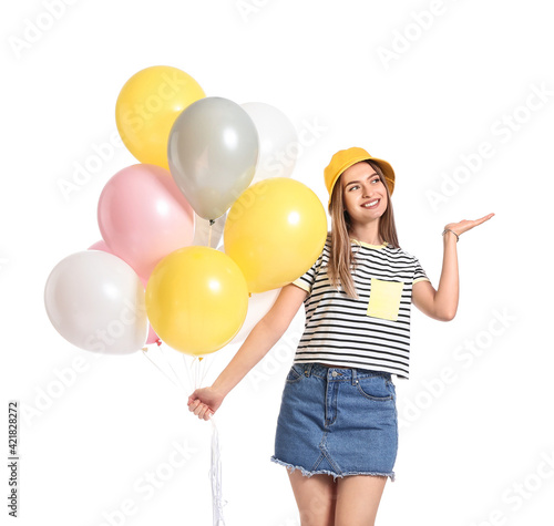 Beautiful young woman with balloons on white background © Pixel-Shot