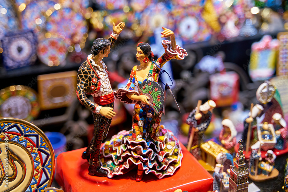Memory of the city of Seville with a couple of figures dancing Sevillanas Memory of the city of Seville with a couple of figures dancing Sevillanas