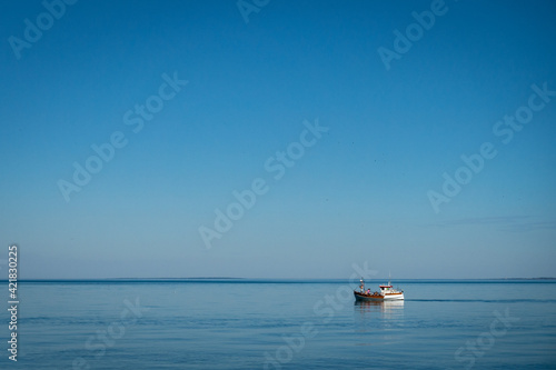 Lonely boat in the sea outside Sweden © Carolin