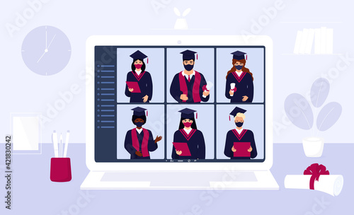 A group of multiethnic graduates in gowns and mortarboards celebrate graduation during coronavirus quarantine. Virtual online ceremony on a laptop monitor. Diverse students wearing protective masks