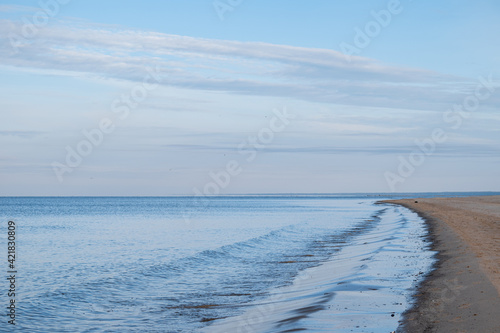 Calm Baltic Sea during sunny day with blue sky and some clouds near Carnikava  Latvia