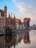 Reflection Of Buildings In City River In Gdansk Poland