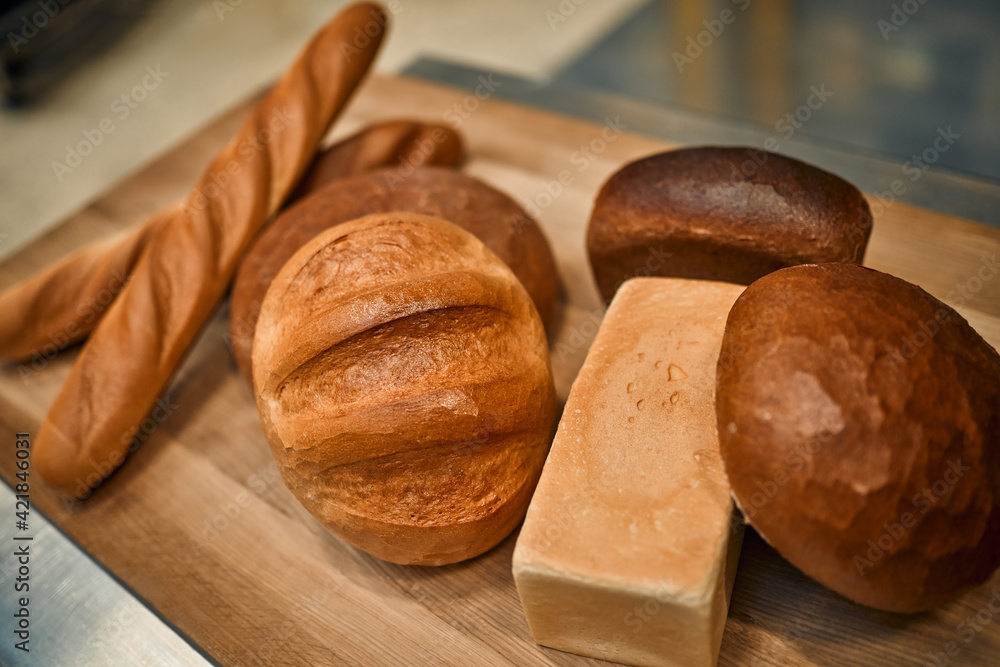 Different bread on a rustic background. bakery products. Factory bakery concept. bakery products. Healthy eating.
