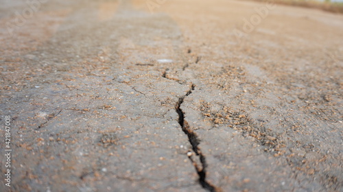 Dry soil surface with sand cracked and drought. Texture background
