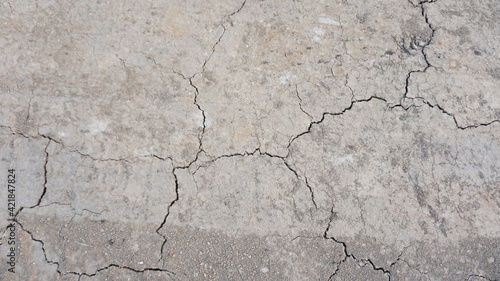 Dry soil surface with sand cracked and drought. Texture background