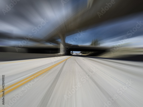 Motion blur view of Los Angeles route 118 freeway and route 405 interchange bridges in Southern California.