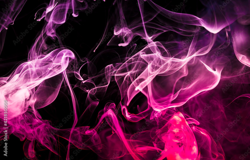 Fototapeta premium Colored smoke on black background