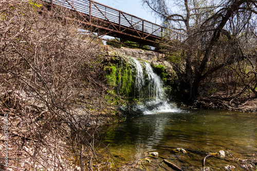 Waterfall and Bridge on Twin Lakes Trail in Spring Cedar Park Texas  photo