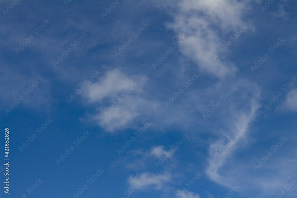 Beautiful white cotton-like clouds. White cloud cumulus. Water in the form of steam in the sky Beautiful white cotton-like clouds. White cloud cumulus. Water in the form of steam in the sky
