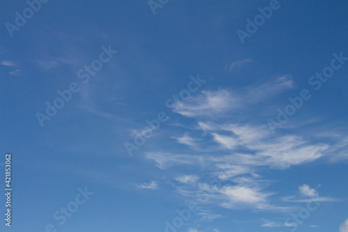 Fototapeta Naklejka Na Ścianę i Meble -  Beautiful white cotton-like clouds. White cloud cumulus. Water in the form of steam in the sky