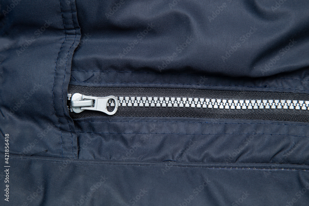 Zipper lock on the jacket.Replacing the locks on the jacket. Zipper lock on the jacket.Replacing the locks on the jacket.