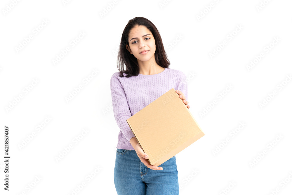 Latin woman with a cardboard box in hands on white background Latin woman with a cardboard box in hands on white background