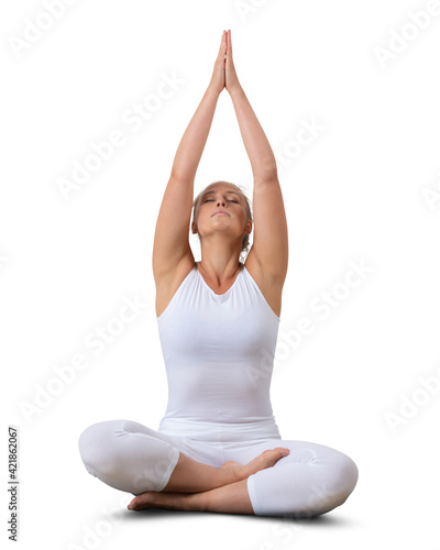 Woman sitting and meditating in a yoga pose isolated on white background
