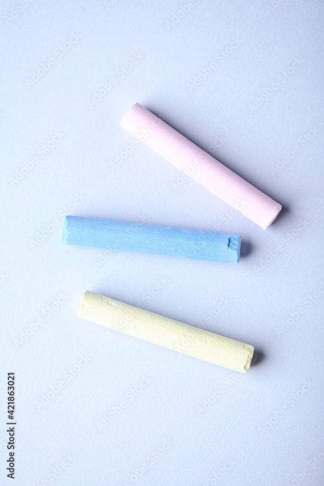 Soft pastels on bright background. Top view. Close up. Soft pastels on bright background. Top view. Close up.