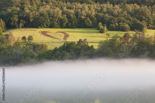 Fototapeta Naklejka Na Ścianę i Meble -  heart on a mountain meadow in the Bieszczady Mountains